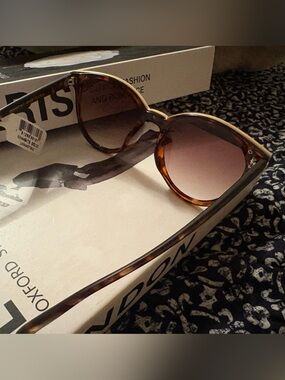 Nanette Lepore Rounded Trending Sunglasses